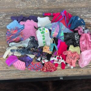 Large Lot Of Barbie Clothing